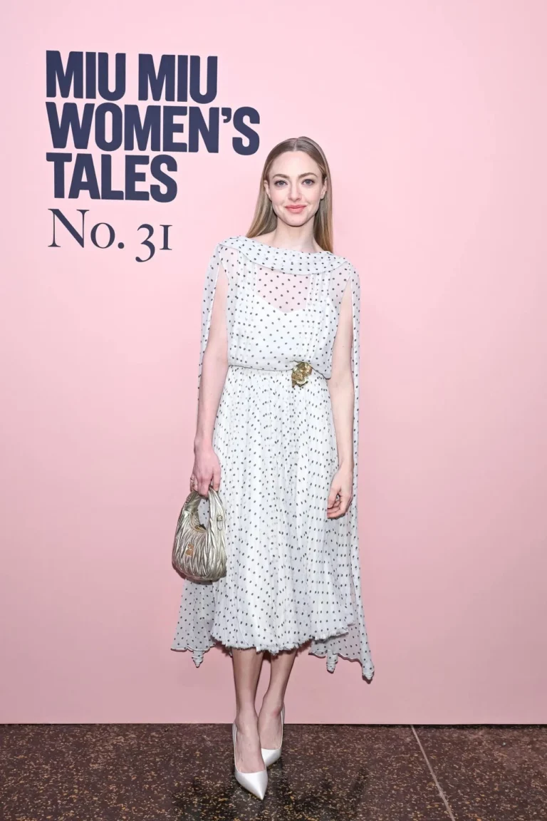 Amanda Seyfried in white polka-dot chiffon dress at Miu Miu NYC event