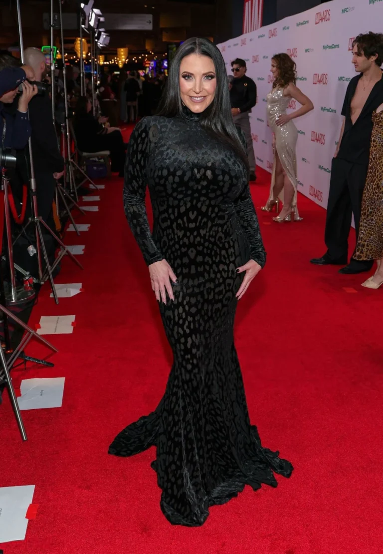 Angela White Keeps It Sleek in a Leopard-Pattern Black Gown in Las Vegas