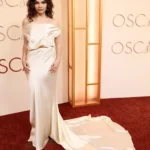 Ariana Greenblatt 2026 Oscars red carpet ivory Dior gown