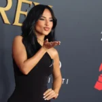 Becky G posing at MusiCares gala honoring Mariah Carey