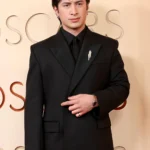 Hudson Williams all black suit 98th Oscars red carpet
