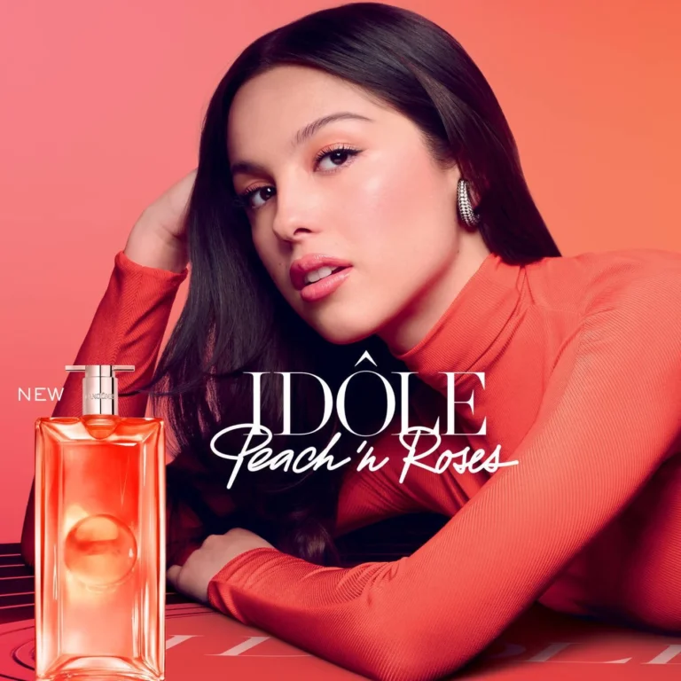 Idôle Peach ‘N Roses perfume bottle featured alongside Olivia Rodrigo in campaign image