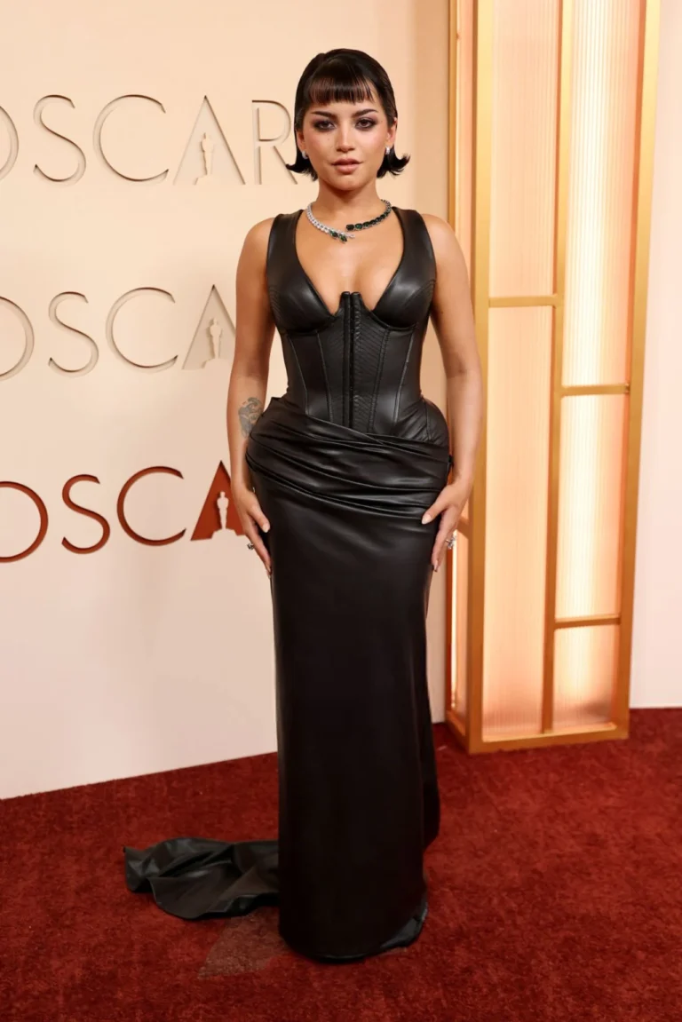 Isabela Merced leather corset gown Oscars 2026 red carpet