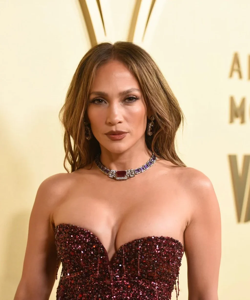 Jennifer Lopez in beaded red strapless gown with Sabyasachi High Jewelry in Los Angeles