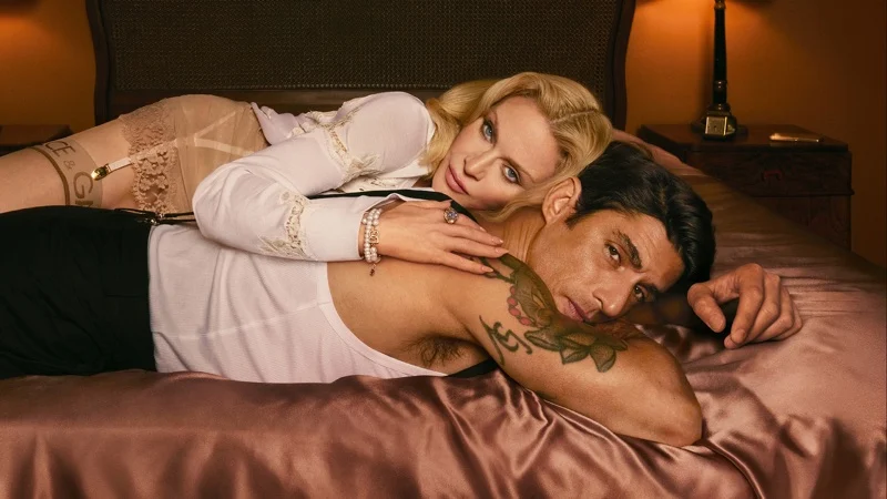 Madonna posing with Alberto Guerra in The One fragrance advertisement