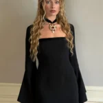Margot Robbie wearing black Roberto Cavalli dress January 2026