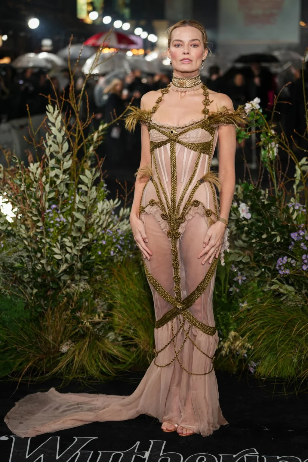 Margot Robbie wearing a sheer pink Dilara Findikoglu gown at Wuthering Heights UK premiere