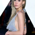 Natasha Arben side-swept hair silver dress red carpet fashion