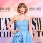 Fall 2023's Signature Look: Taylor Swift Sparkles with Short Gold Nails